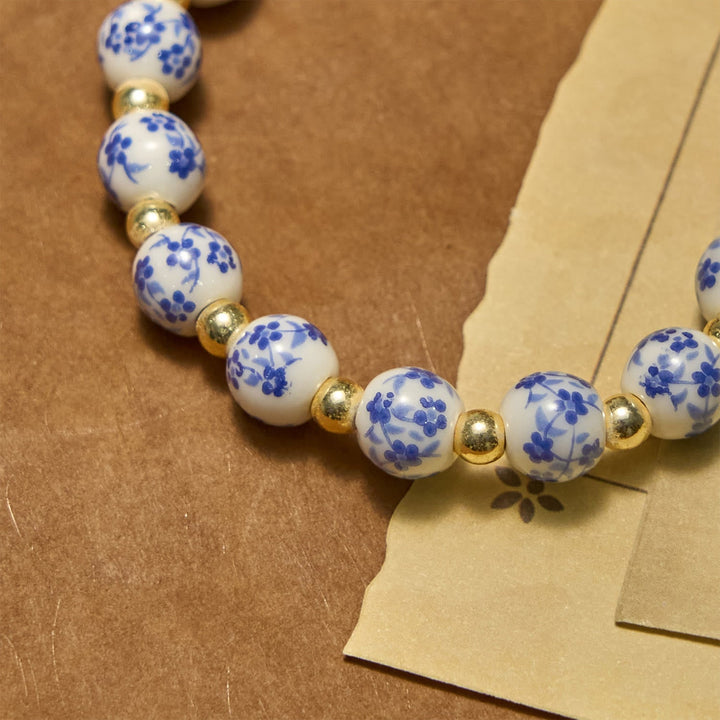 Our Lady Medal & Cross Floral-Inspired Bracelet: Faith Meets Style