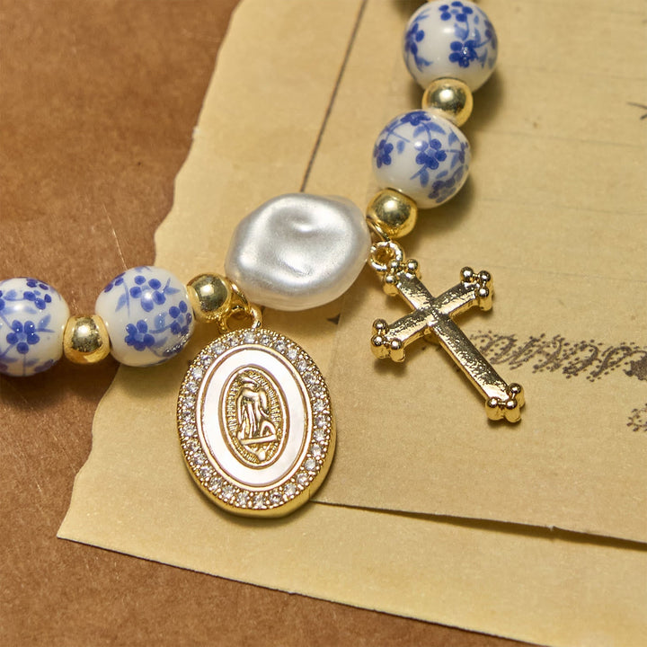 Our Lady Medal & Cross Floral-Inspired Bracelet: Faith Meets Style