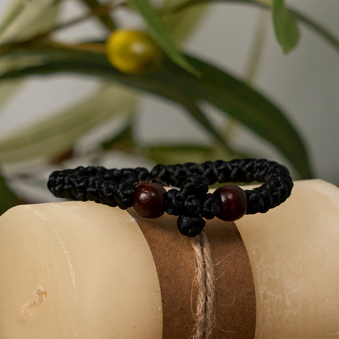 Blue & Black Cross - Knot String Bracelet: A Token of Faith