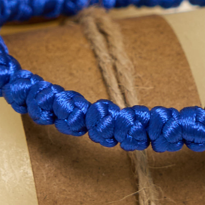 Blue & Black Cross - Knot String Bracelet: A Token of Faith