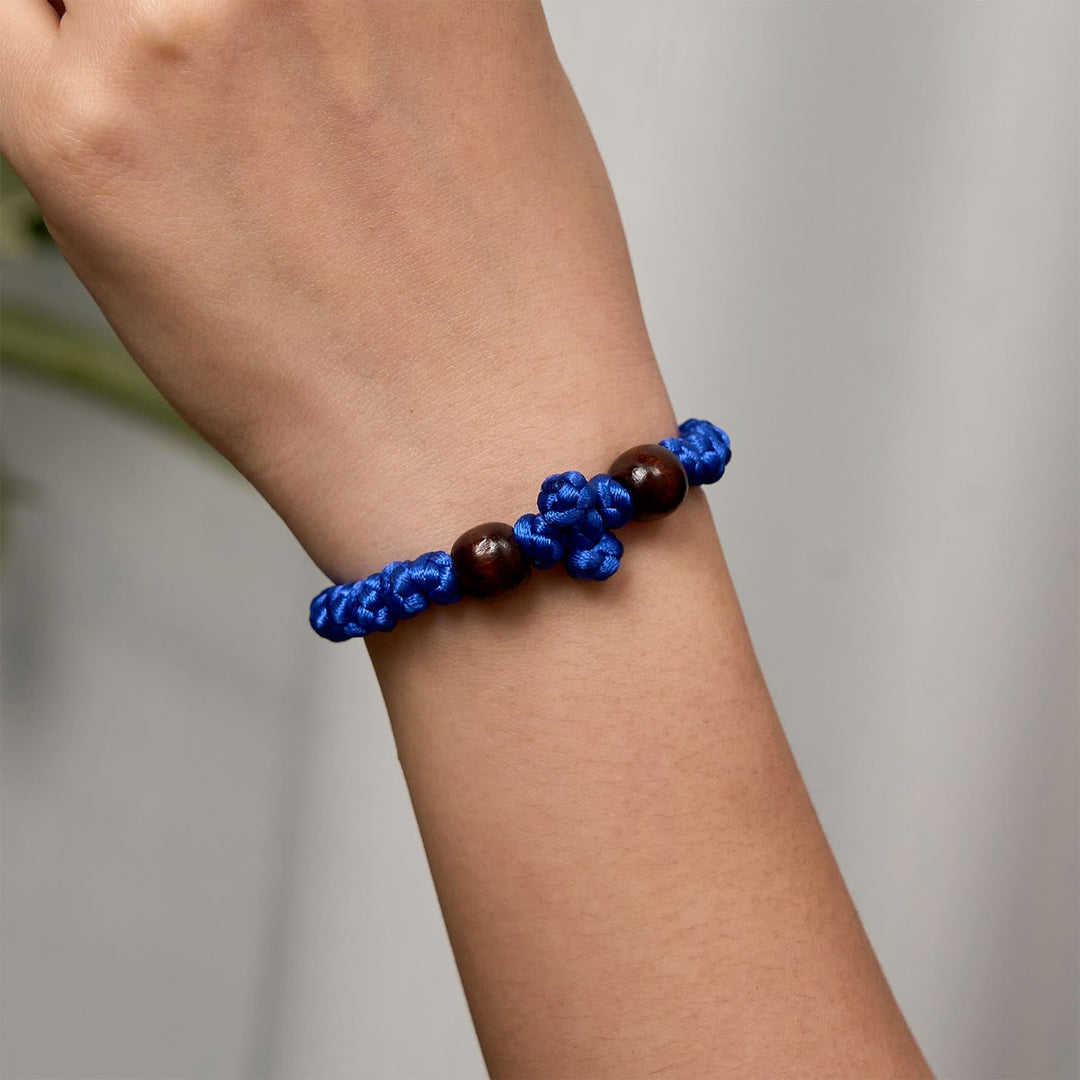 Blue & Black Cross - Knot String Bracelet: A Token of Faith