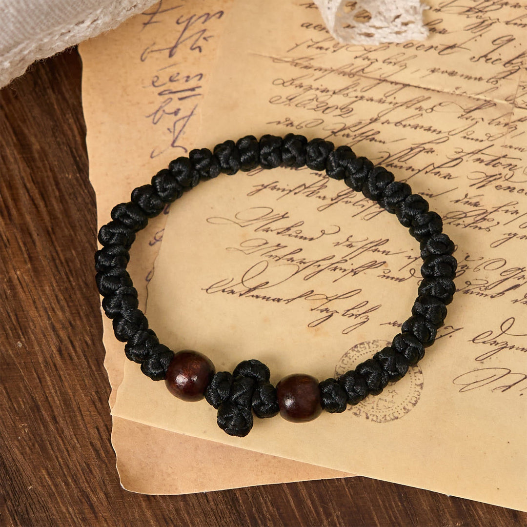 Blue & Black Cross - Knot String Bracelet: A Token of Faith