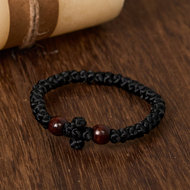 Blue & Black Cross - Knot String Bracelet: A Token of Faith