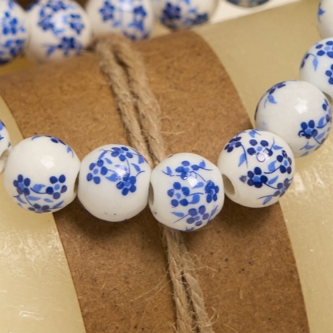 Blue & White Beaded Floral Bracelet with Miraculous Medal