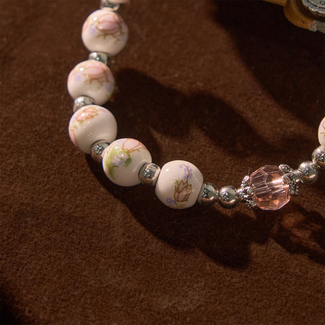 Multi-color Floral Ceramic Stretch Bracelet with Miraculous Medal & Crucifix: Subtle Faith Elegance