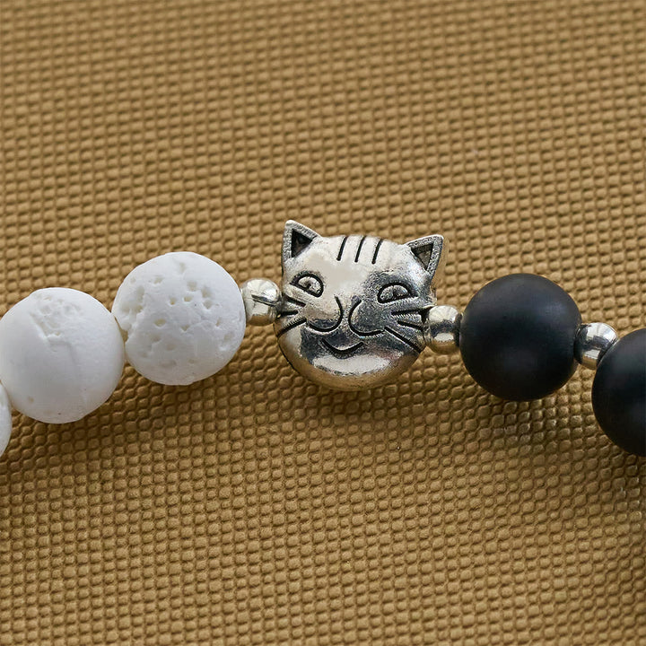 Matte Black and White Lava Stone with Cow Cat Blessing Animal Bracelet