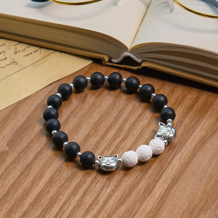 Matte Black and White Lava Stone with Cow Cat Blessing Animal Bracelet