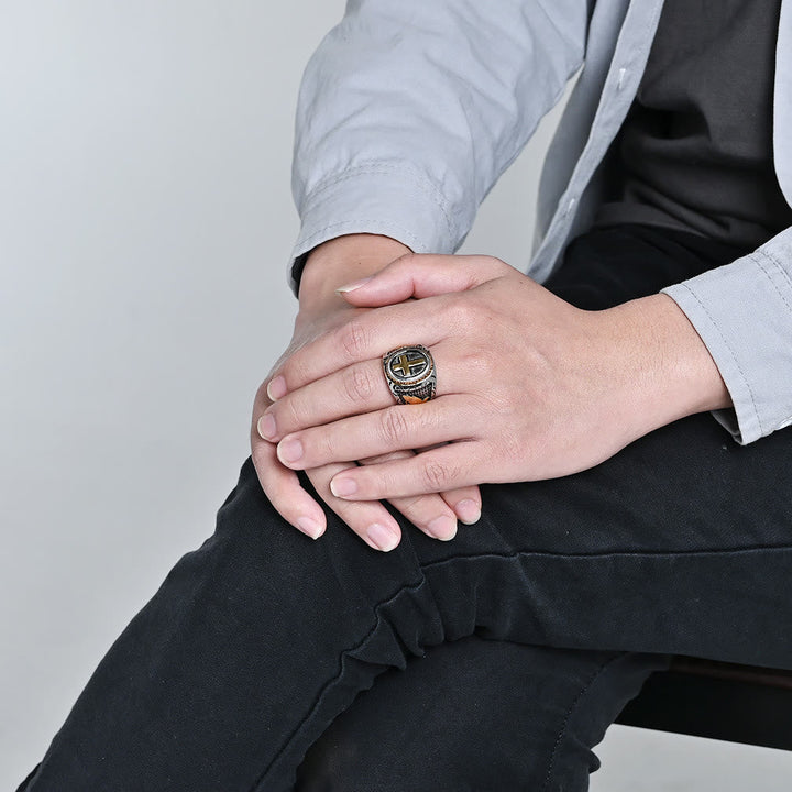 Metallic Cross Ring with Praying Hands Detail: Spiritual Fashion Pick