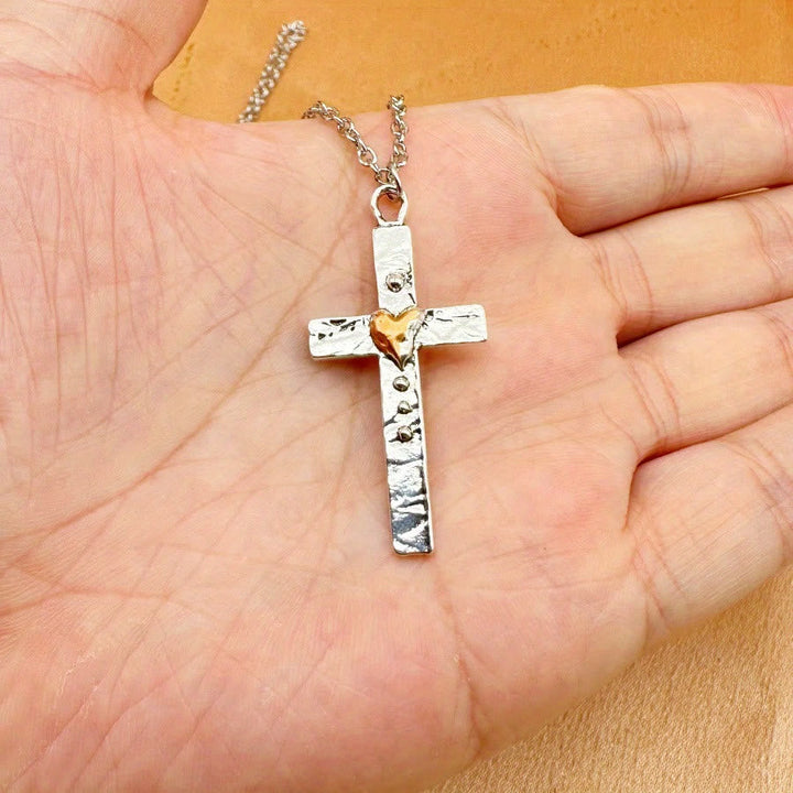 Dual - Tone Cross Necklace: Faith and Love in Artistic Design
