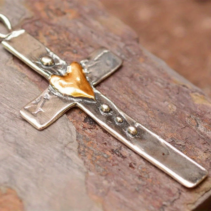 Dual - Tone Cross Necklace: Faith and Love in Artistic Design