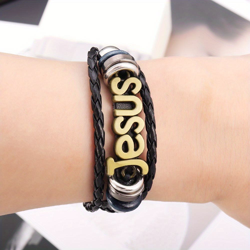 Two - Tone Jesus Charm Bracelet on Black Braided Leather