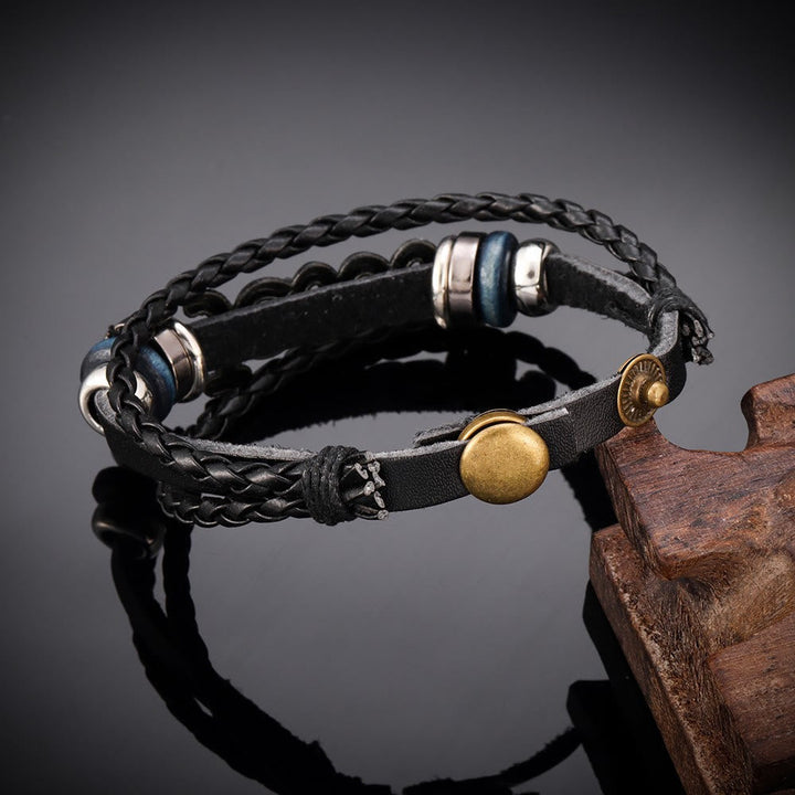 Two - Tone Jesus Charm Bracelet on Black Braided Leather