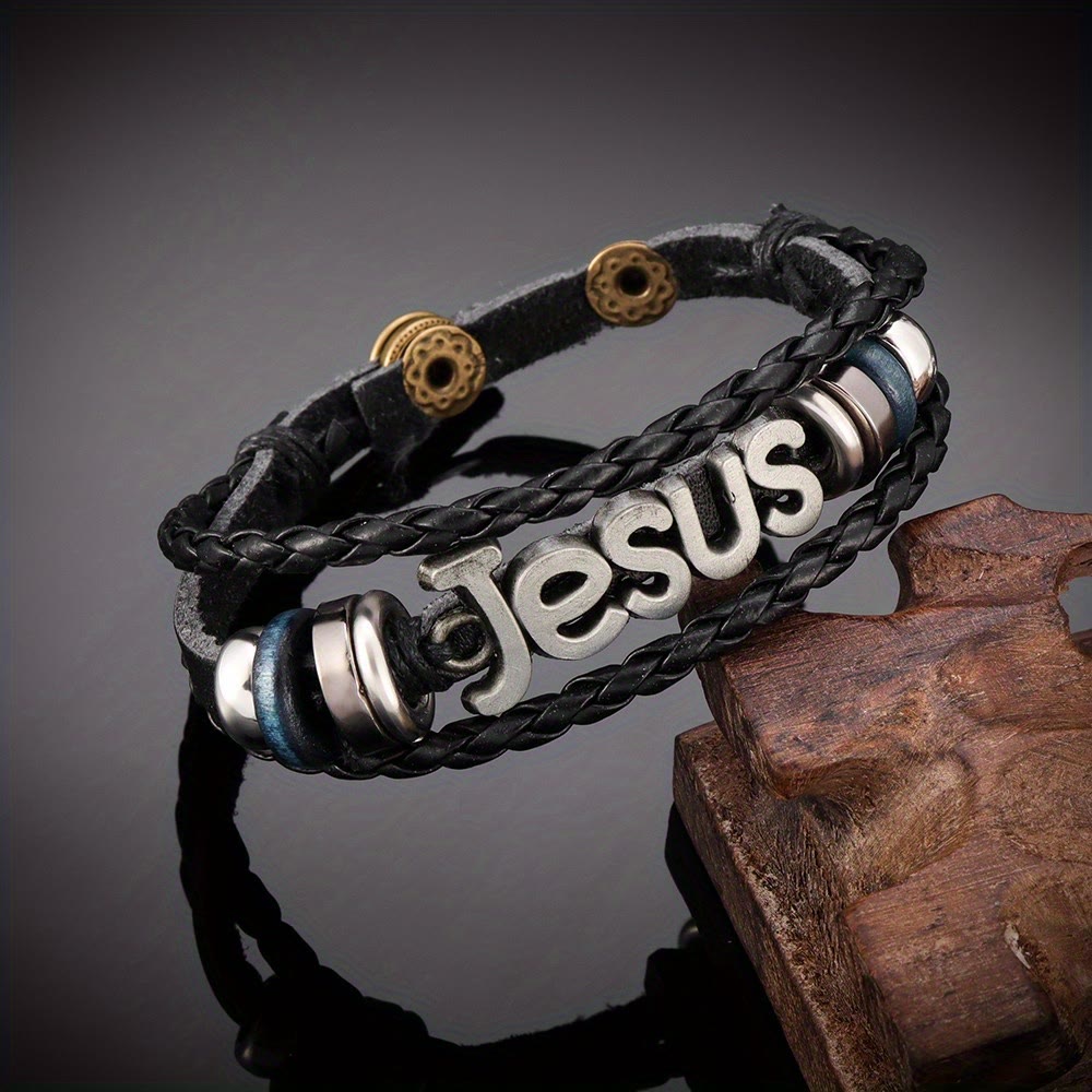 Two - Tone Jesus Charm Bracelet on Black Braided Leather