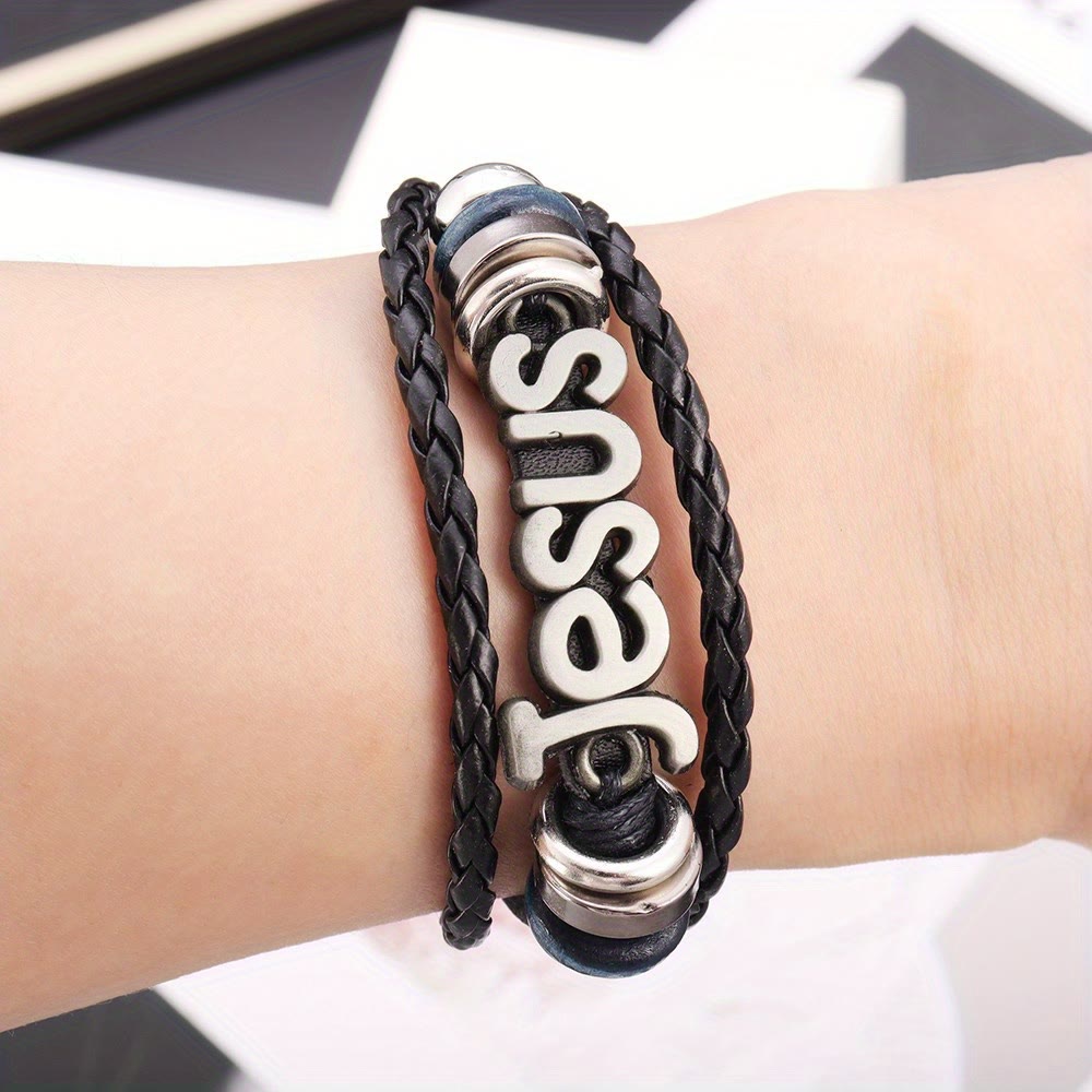 Two - Tone Jesus Charm Bracelet on Black Braided Leather