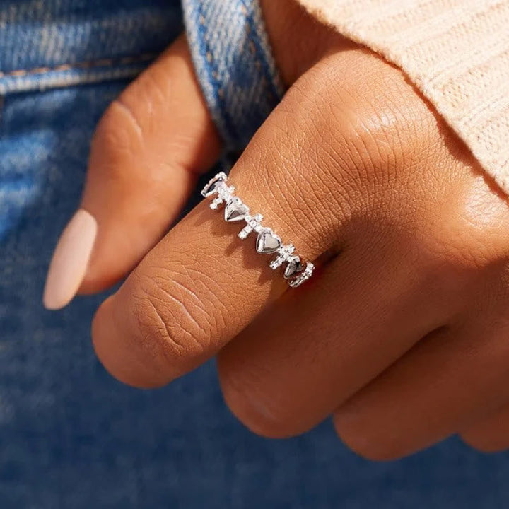 Heart & Zircon Faith Ring: Minimalist Elegance with Spiritual Significance