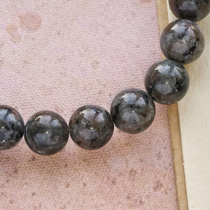 Glowing Flame-Stone Color-Shifting Bracelet with Ichthus Pendant