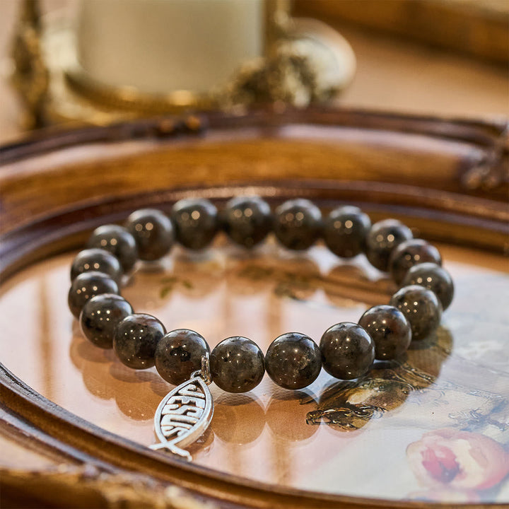 Glowing Flame-Stone Color-Shifting Bracelet with Ichthus Pendant