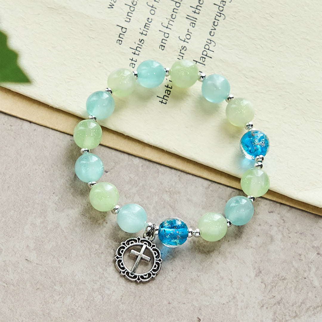 UV-Changing Glitter Bead Bracelet with Ornate Cross: Shimmer in Faithful Hues