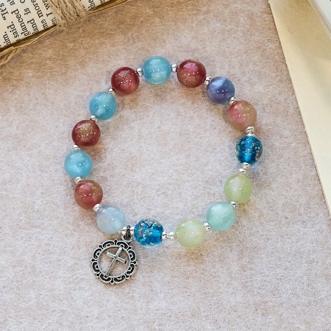 UV-Changing Glitter Bead Bracelet with Ornate Cross: Shimmer in Faithful Hues