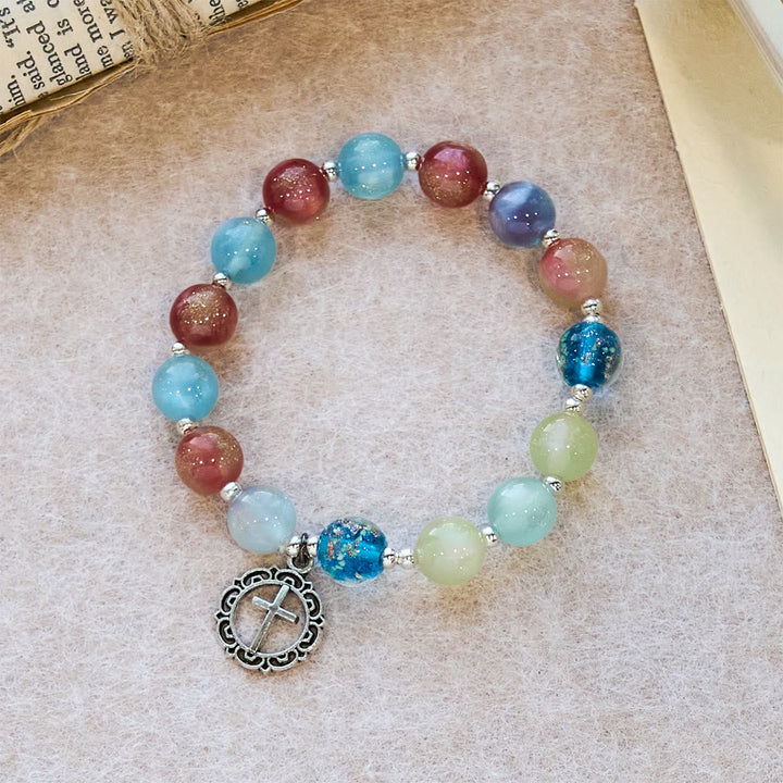 UV-Changing Glitter Bead Bracelet with Ornate Cross: Shimmer in Faithful Hues