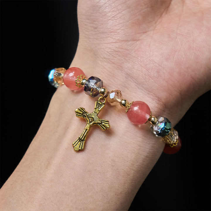 Pink Crystal & Multi-Faceted Bead Bracelet with Golden Crucifix: Dazzling Faith for Daily Style