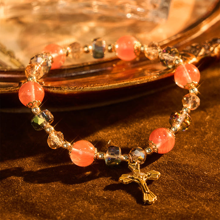 Pink Crystal & Multi-Faceted Bead Bracelet with Golden Crucifix: Dazzling Faith for Daily Style