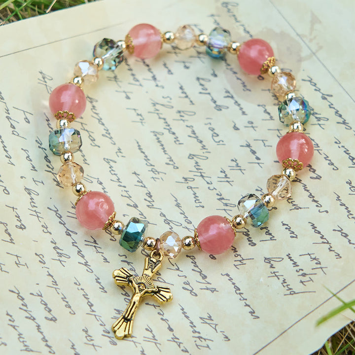Pink Crystal & Multi-Faceted Bead Bracelet with Golden Crucifix: Dazzling Faith for Daily Style