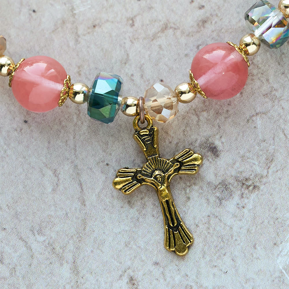 Pink Crystal & Multi-Faceted Bead Bracelet with Golden Crucifix: Dazzling Faith for Daily Style