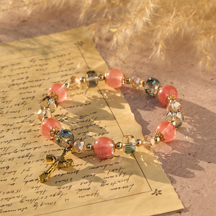 Pink Crystal & Multi-Faceted Bead Bracelet with Golden Crucifix: Dazzling Faith for Daily Style