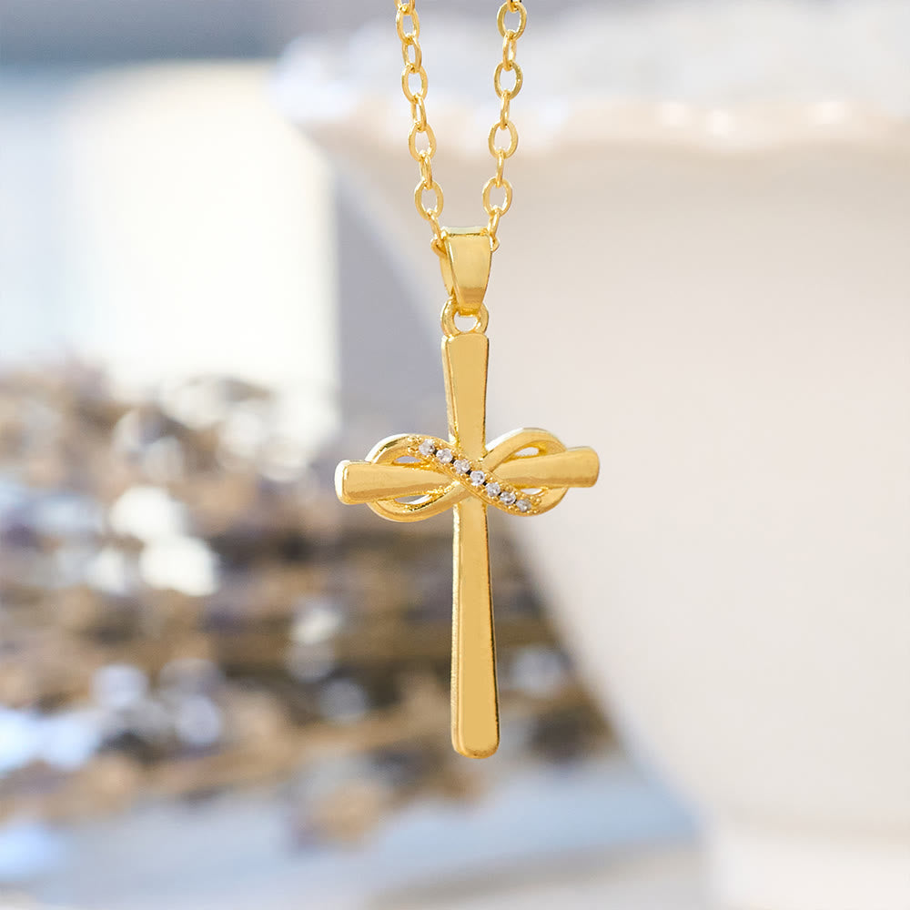 Möbius Cross & Zircon Necklaces: Smooth Comfort with Sacred Symbolism