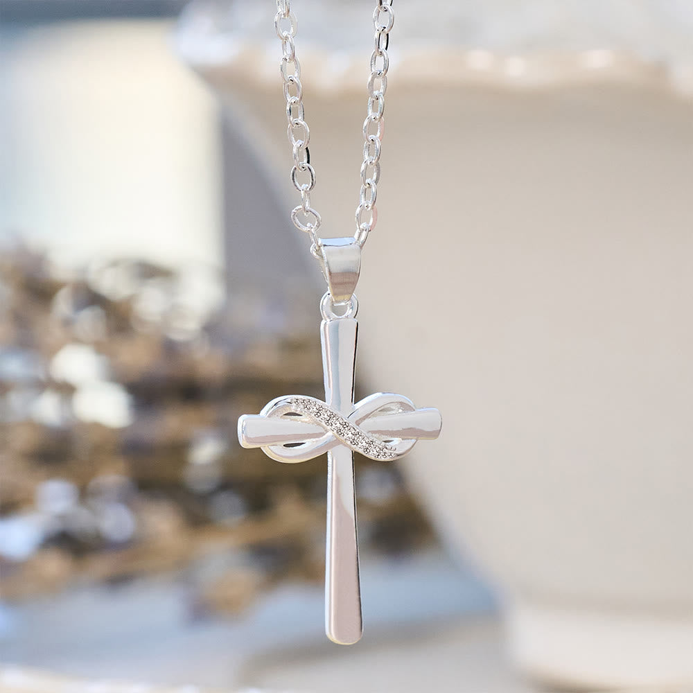 Möbius Cross & Zircon Necklaces: Smooth Comfort with Sacred Symbolism