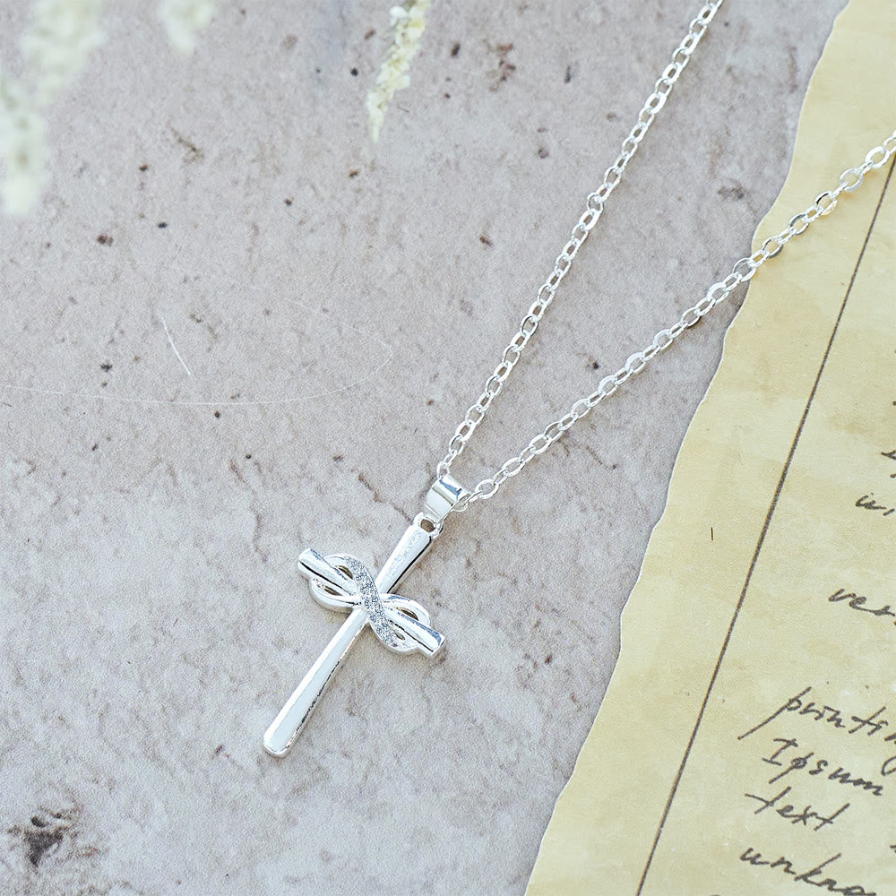 Möbius Cross & Zircon Necklaces: Smooth Comfort with Sacred Symbolism