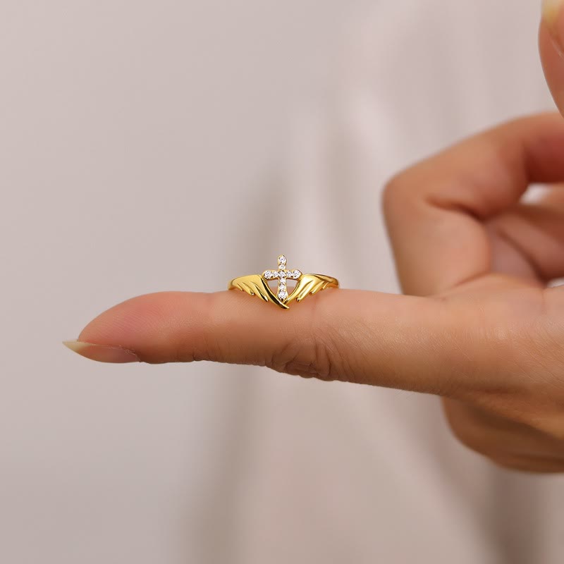 Silver Cross Wing Ring with Cubic Zirconia Accents: Embody His Angelic Protection