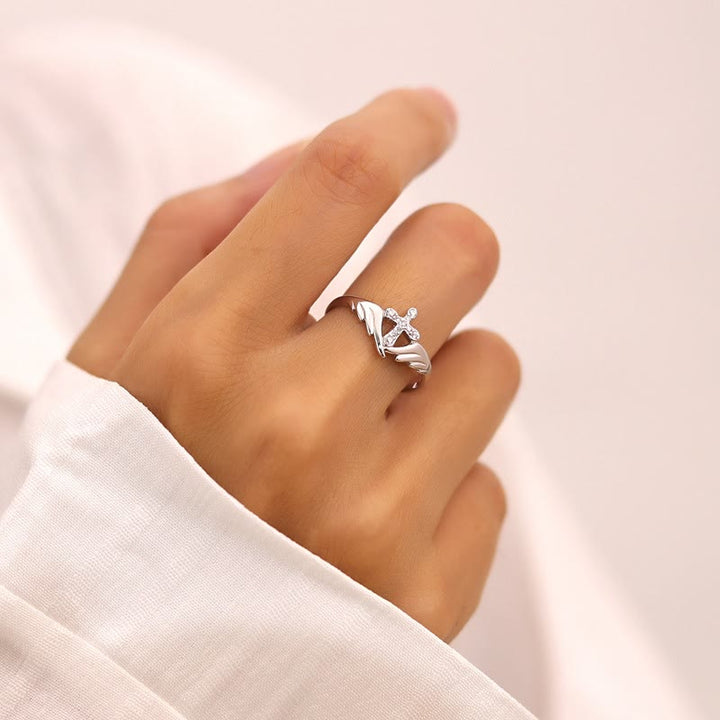 Silver Cross Wing Ring with Cubic Zirconia Accents: Embody His Angelic Protection