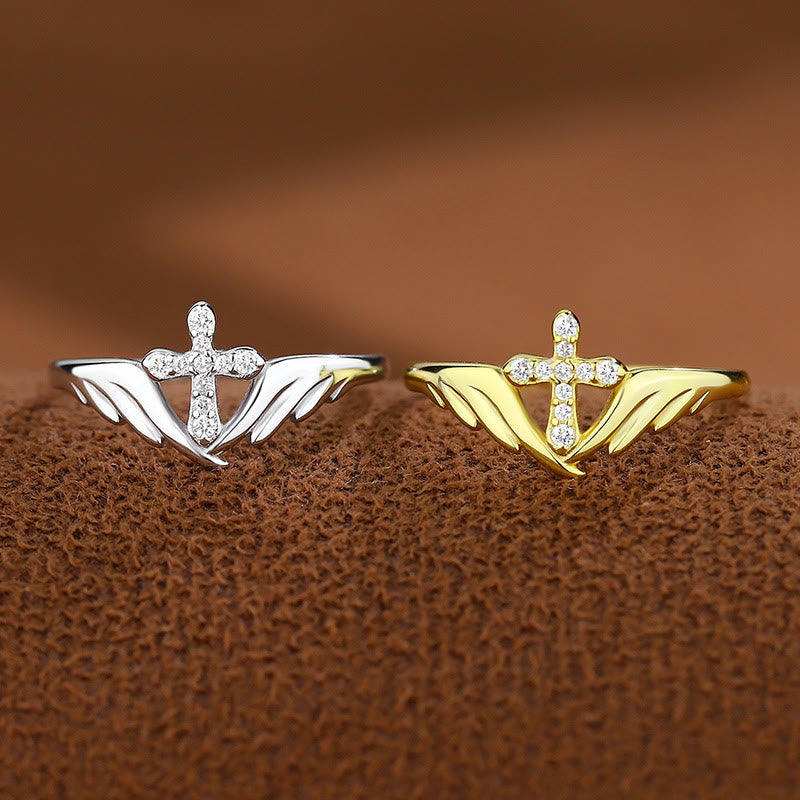 Silver Cross Wing Ring with Cubic Zirconia Accents: Embody His Angelic Protection