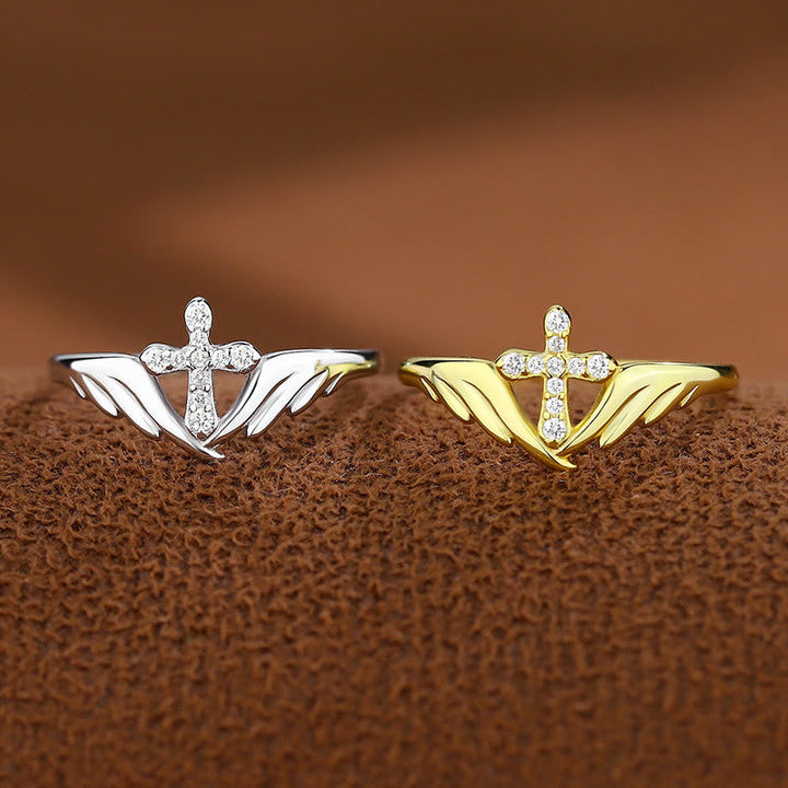 Silver Cross Wing Ring with Cubic Zirconia Accents: Embody His Angelic Protection