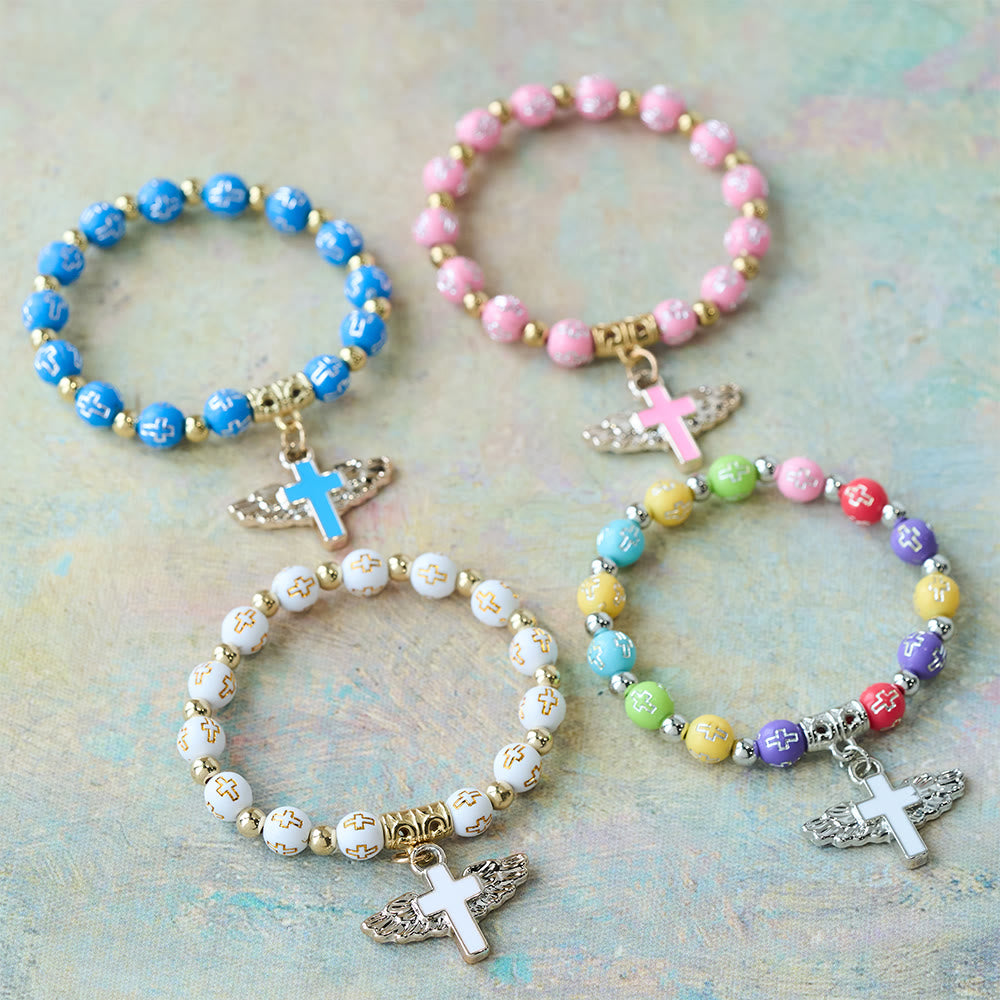 Winged Cross Charm Bracelet: A Visual Prayer of Devotion and Connection