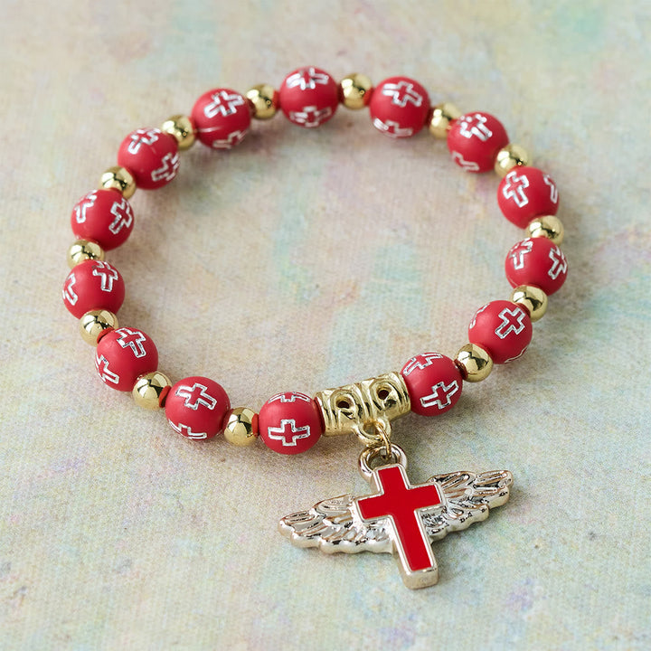 Winged Cross Charm Bracelet: A Visual Prayer of Devotion and Connection