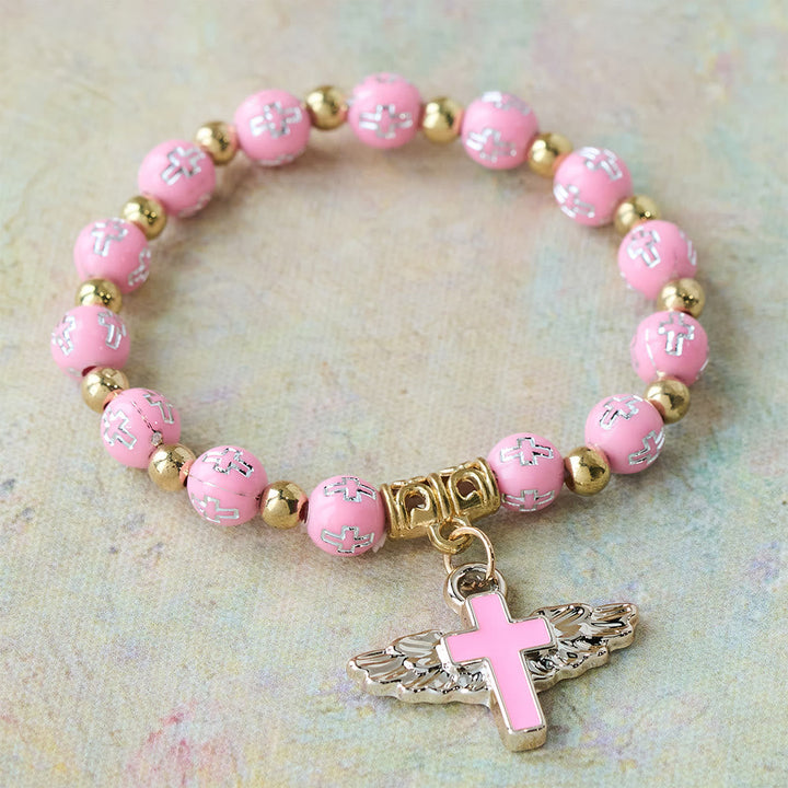 Winged Cross Charm Bracelet: A Visual Prayer of Devotion and Connection