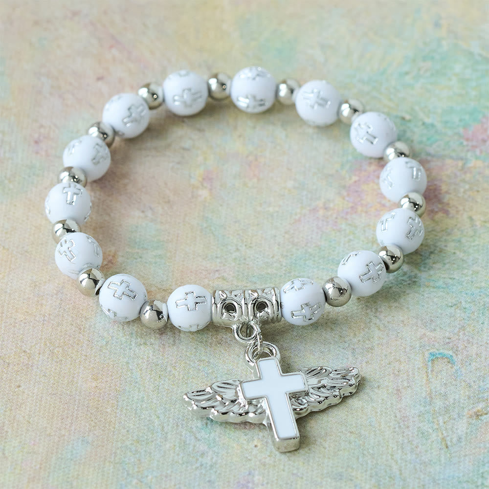 Winged Cross Charm Bracelet: A Visual Prayer of Devotion and Connection