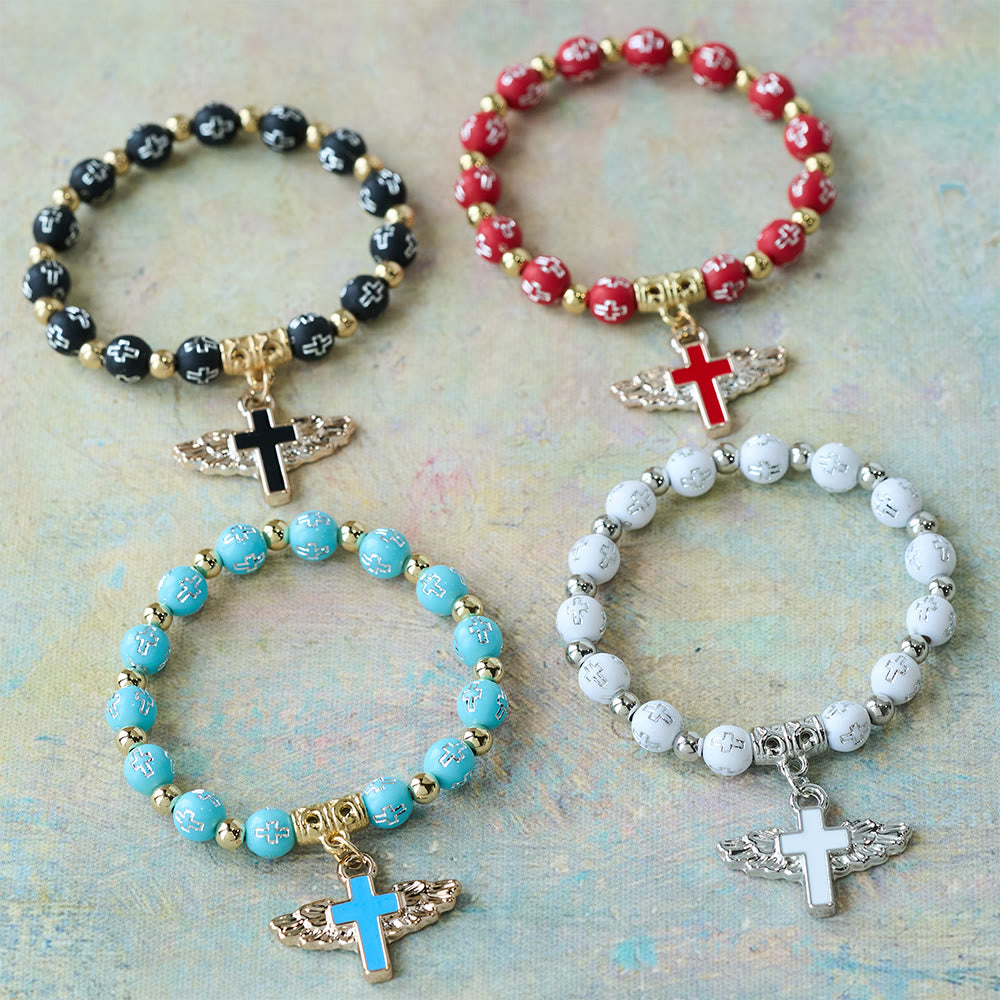 Winged Cross Charm Bracelet: A Visual Prayer of Devotion and Connection