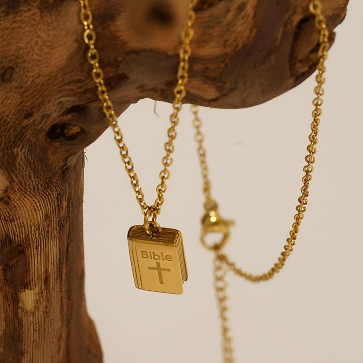 Bible Pendant Necklace with Cross Motif: Elevate Your Style with Spiritual Meaning