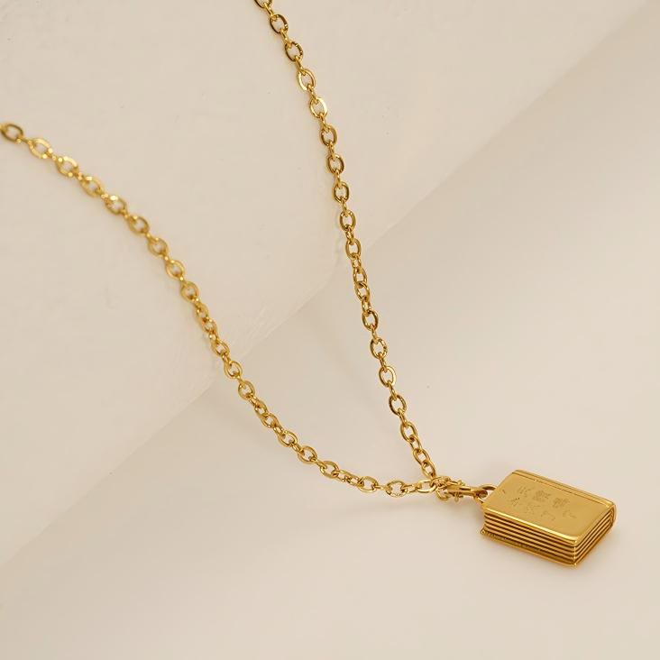 Bible Pendant Necklace with Cross Motif: Elevate Your Style with Spiritual Meaning