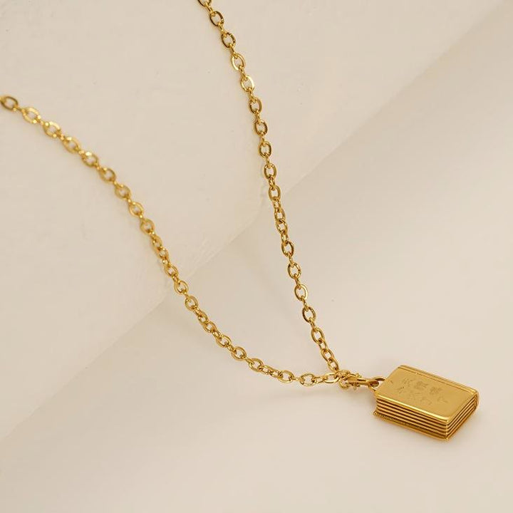 Bible Pendant Necklace with Cross Motif: Elevate Your Style with Spiritual Meaning