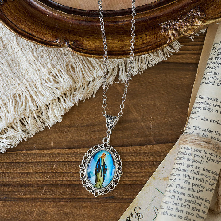 Filigree Frame Our Lady Portrait Necklace: A Symbol of Sacred Grace and Divine Light