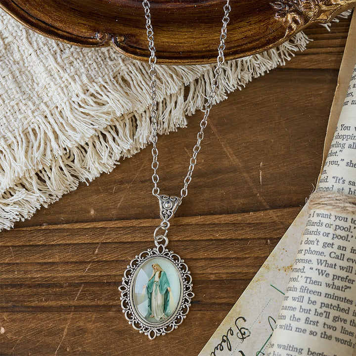 Filigree Frame Our Lady Portrait Necklace: A Symbol of Sacred Grace and Divine Light