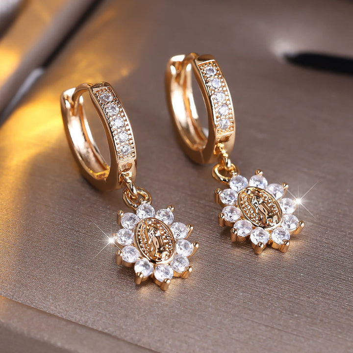 Our Lady Zircon Halo Huggie Earrings with Sunburst Medallion