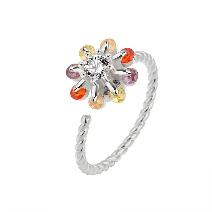 Silver anxiety ring with a colorful charm spinner ring