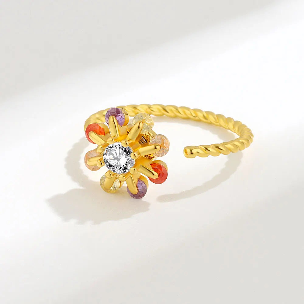 Silver anxiety ring with a colorful charm spinner ring