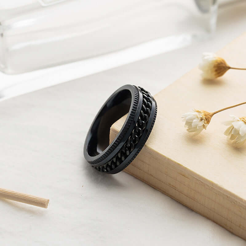 Rotatable bottle opener ring black